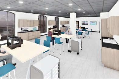 featuring tables with 3D printers and people working, surrounded by windows and storage units.