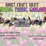 The image is an announcement for "Adult Craft Night: Spring Fabric Garland" set against a vivid background of a tulip field. The tulips, in shades of pink, yellow, and cream, stretch across the entire image, creating a colorful and vibrant field. Across the image, a fabric garland, composed of various colored and patterned fabric strips tied together, spans horizontally. In the center, there is a small wooden sign attached to the garland that reads "Hello Spring" with decorative flowers. The event details are stated in black text towards the bottom: "New London Public Library Thursday, March 12th, 2026, 5:00-6:30 PM." In the bottom right corner, additional text notes the registration details, "Call 920-982-8519 to register. Limited Seating."