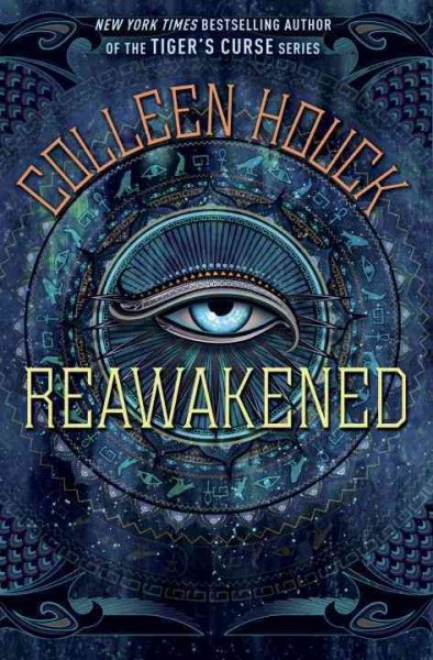 An illustrated book cover featuring an eye in the center surrounded by intricate mystical designs. The title "Reawakened" and author "Colleen Houck" are displayed.