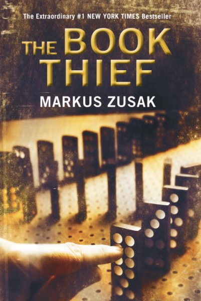 Cover of "The Book Thief" by Markus Zusak showing a hand pushing over dominoes.
